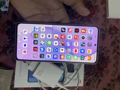 I am selling redmi note 13 8gb vs 256gb condition 10 by 10 ha