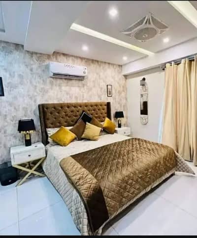 Par Day and short Time One and Two BeD Room appaertment Available Bahria Town Phase 4 and 6 Empire Heights 2 family apartment any time available