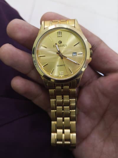 Golden colour Watch