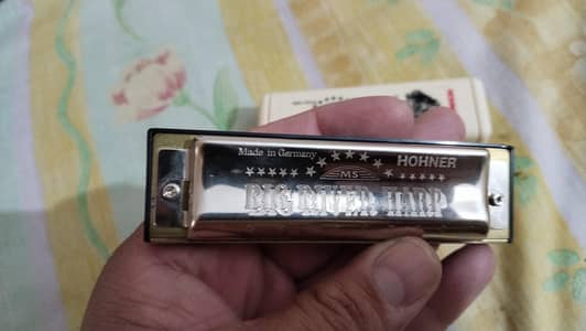 harmonica 10 holes made in Germany it's original guaranty full new box