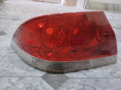 Mitsubishi lancer left side back light