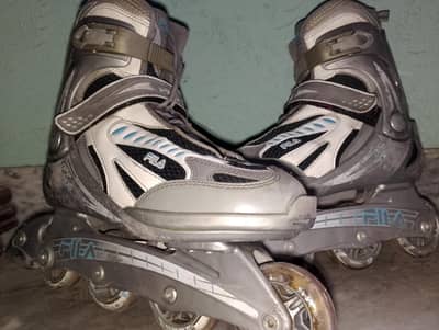 FILA Original Inline Skating shoes  Adjustable size excellent cond