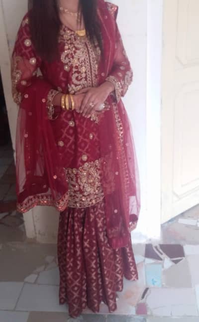 Shahposh Ghrara set with heavy work nd net dupata
