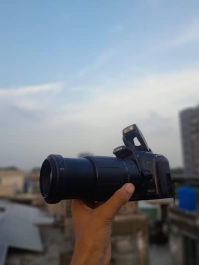 canon 1000d with 80/200 auto+manual lense full hd dsrl all ok urgent