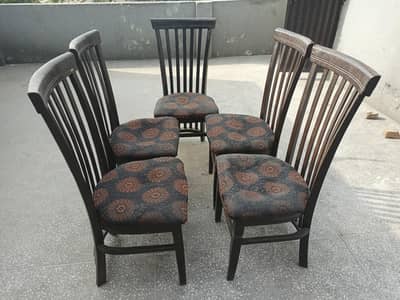 Dining table and 5 chairs for sale wooden frame with glass top