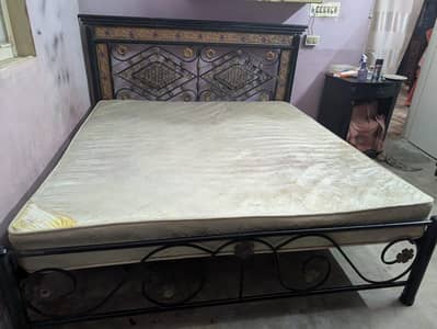 Iron bed with spring mattress