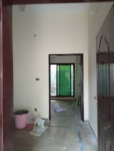 Lower portion for rent 1bad attached bathroom TV launch kitchen marble flooring wood wark small family