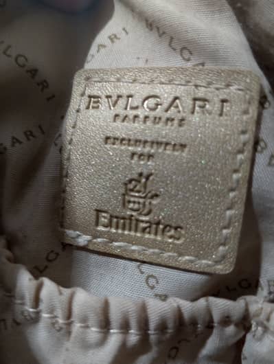 Bvlgari beige faux leather cosmetic pouch from an Emirates     travel