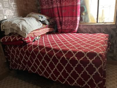 Bed and cupboard
