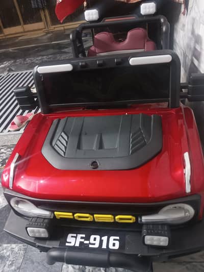 baby charging jeep