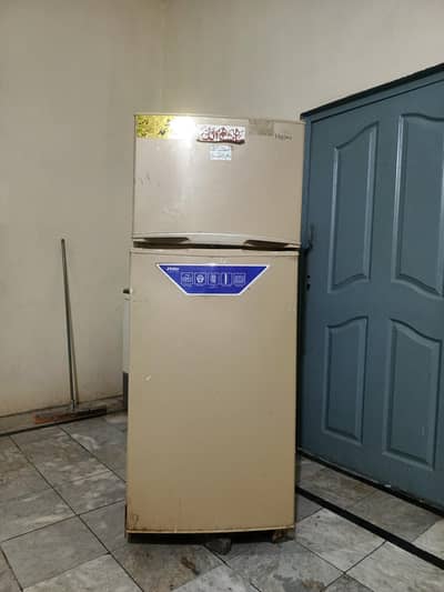 Haier double-door fridge sale ke liye available hai.