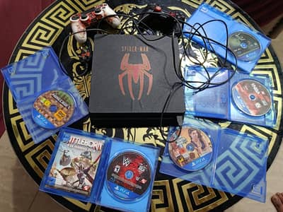 playstation 4 with 2 controller and 5 CD