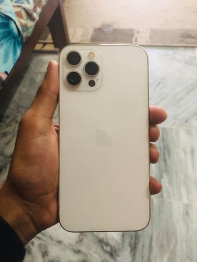 phone 12 pro max . . white colour . water proof 6 Ram. storage 128