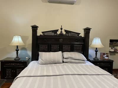 doublebed with two nightstand tables