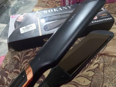 HAIR STRAIGHTENER AND CULER