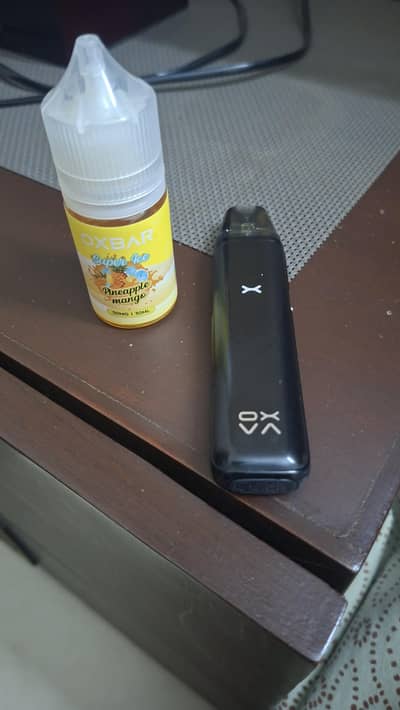 oxva xlim go2 with orignal box 30ml e-liquid, only cash 18+