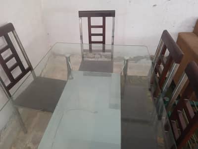 dining table and chairs made of steel