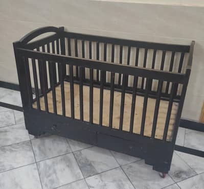 wooden made solid baby cot available