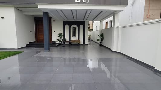 One Kanal Slightly Used Ultra Modern Designer Owner Build Fully Furnished Bungalow For Sale At Prime Location Of DHA Lahore Near To Park Masjid & Commercial Market.