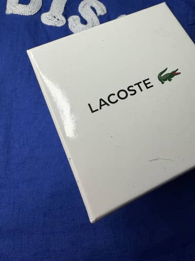 This is mans watch LACOSTE