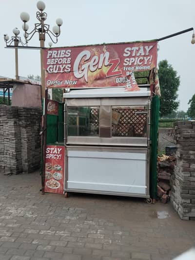Burger and shawarma counter and 2 working tables