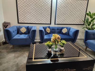 Sofa set with black wooden glass table