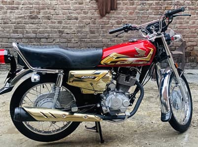 Honda 125 self start gold addition