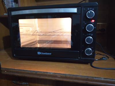 Dawlance 4520 mini cr 45 liter baking cooking grill and cooking