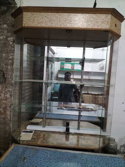 Glass cupboard for general stores