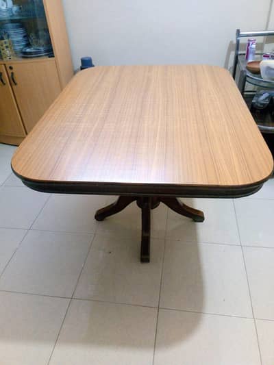 Four seater wooden table