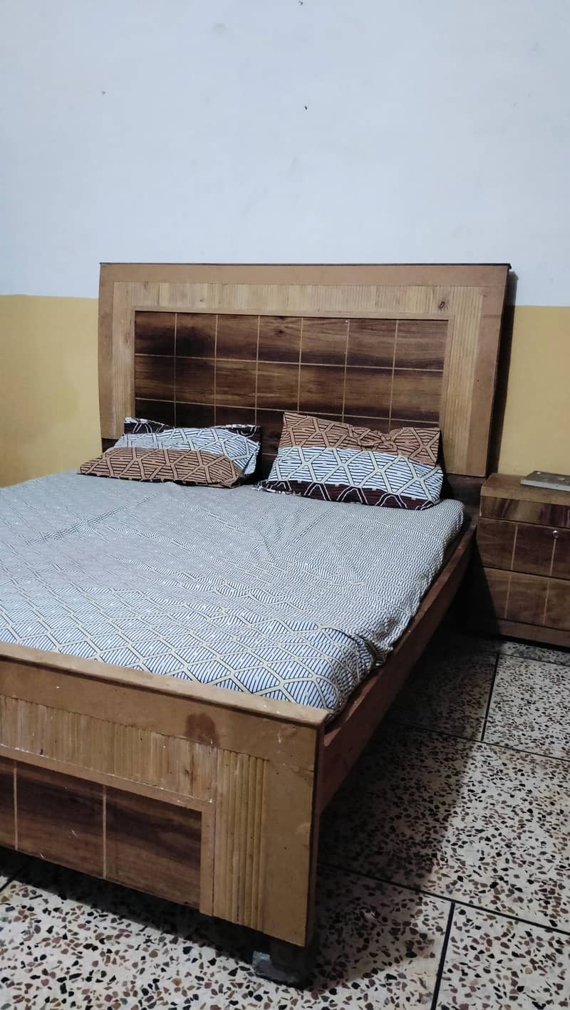 Double bed with side table 0