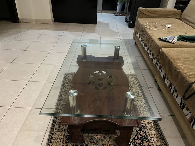L shaped slightly used sofas with good condition table 0