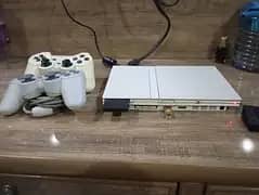 Sony playstation 2 slim for sale.