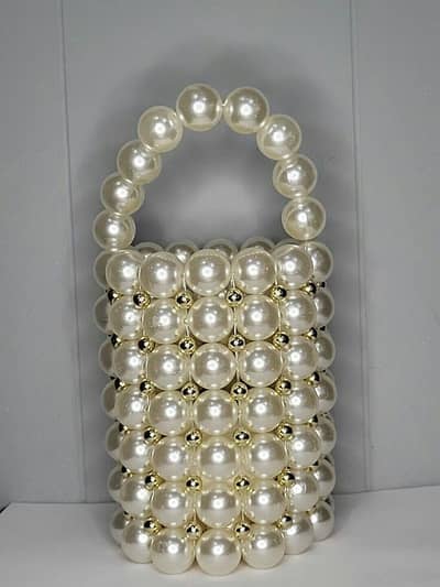 Handmade pearl beads bags available