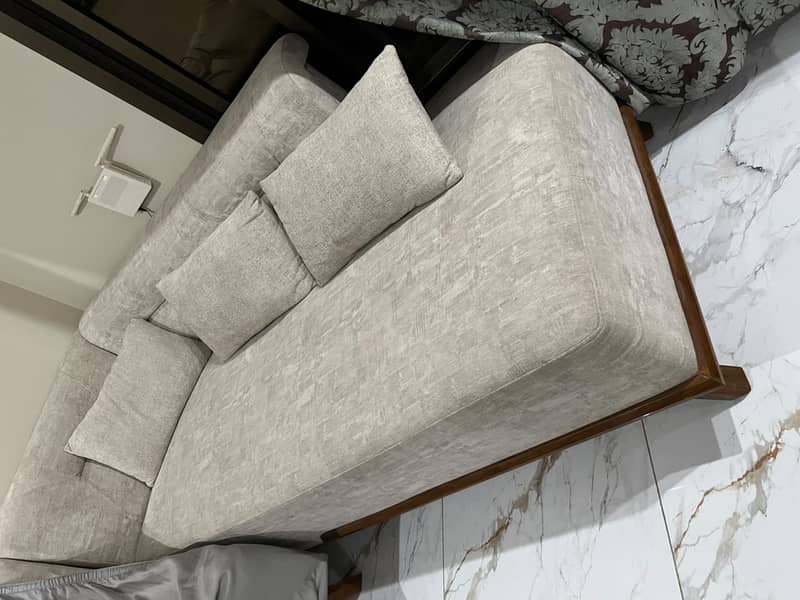 Offwhite colour L shaped sofa 1
