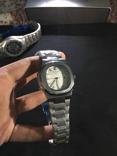 patik Philip white dial