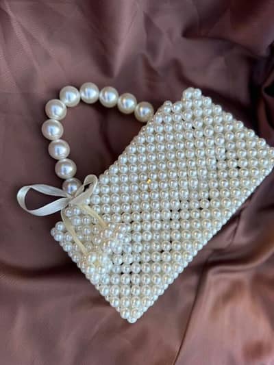 Handmade pearl beads crystal bags available