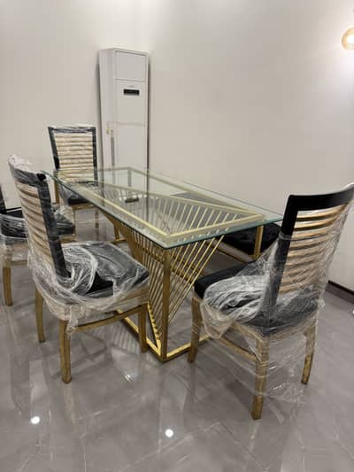 Dinning table with 4 chair and one couch
