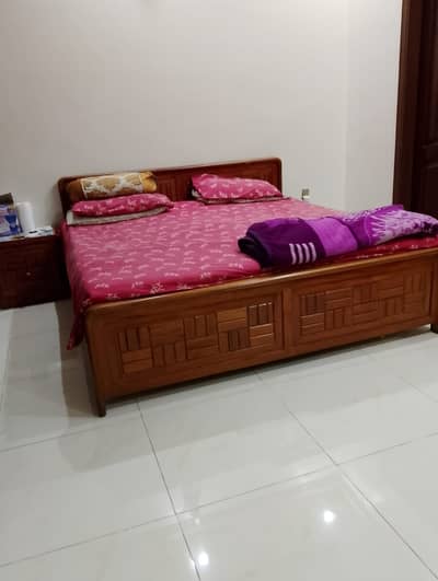 Bed with side table wooden