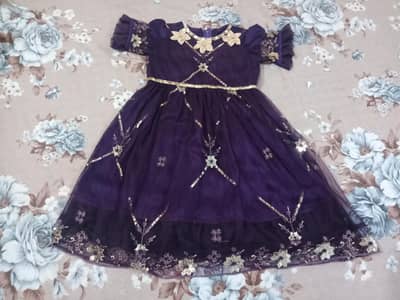 Fancy frock home stitched