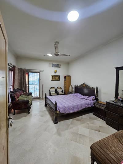 SYED BROTHERS PROUDLY OFFERS: 1-Kanal Elegant And Fully Maintained Bungalow Is Available In The Best Block Of DHA Lahore.