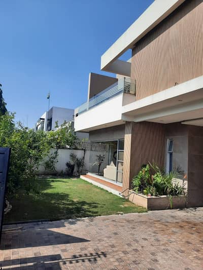SYED BROTHERS PROUDLY OFFERS: 1-Kanal Elegant And Fully Maintained Bungalow Is Available In The Best Block Of DHA Lahore.