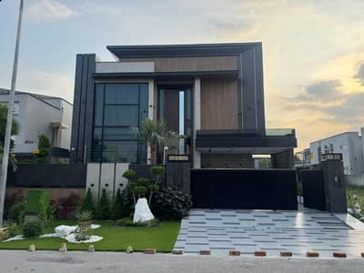 SYED BROTHERS PROUDLY OFFERS: 1-Kanal Elegant And Fully Furnished Modern Bungalow with Basement Is Available In The Best Block Of DHA Lahore.