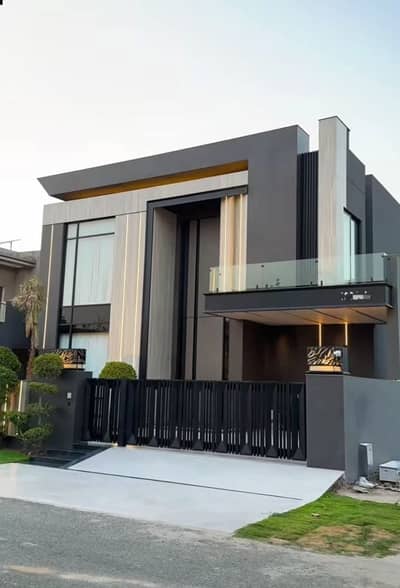 SYED BROTHERS PROUDLY OFFERS: 1-Kanal Elegant And Fully Furnished Modern Bungalow With Basement Is Available In The Best Block Of DHA Lahore.