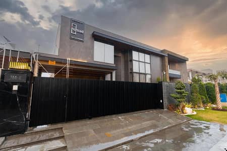 SYED BROTHERS PROUDLY OFFERS: 2-Kanal Elegant And Fully Furnished Bungalow with Basement, Swimming Pool Is Available In The Best Block Of DHA Lahore.