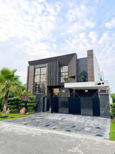 SYED BROTHERS PROUDLY OFFERS: 1-Kanal Elegant And Semi Furnished Modern Bungalow Is Available In The Best Block Of DHA Lahore | ACs Installed.