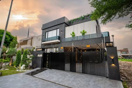 SYED BROTHERS PROUDLY OFFERS: 1-Kanal Elegant And Fully Furnished Bungalow with Basement and Swimming Pool Is Available In The Best Block Of DHA Lahore | Near to Dolmen Mall & Ring Road.