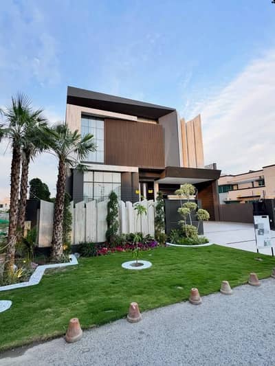SYED BROTHERS PROUDLY OFFERS: 1-Kanal Elegant And Full Furnished Ultra Modern Bungalow With Basement Near To Dolmen Mall and Main Boulevard Is Available In The Best Block Of DHA Lahore.