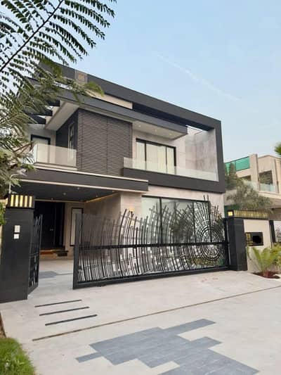 SYED BROTHERS PROUDLY OFFERS: 1 Kanal Elegant And Fully Furnished Bungalow with Basement & Swimming Pool Near Commercial and Dolmen Mall Is Available In The Best Block Of DHA Lahore.
