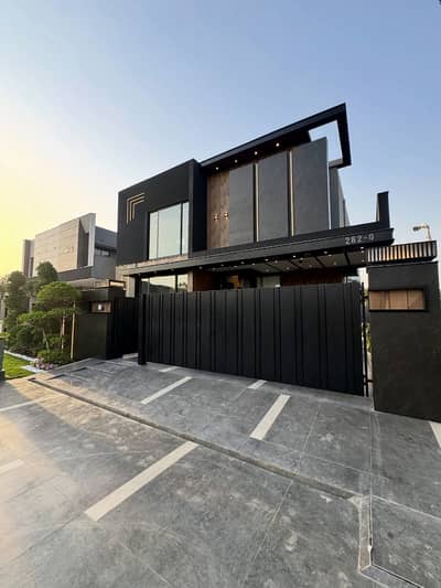 SYED BROTHERS PROUDLY OFFERS: 1-Kanal Elegant And Semi Furnished Modern Bungalow Is Available In The Best Block Of DHA Lahore.